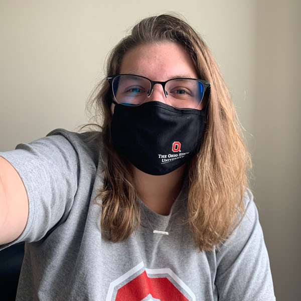 Female Ohio State student in mask