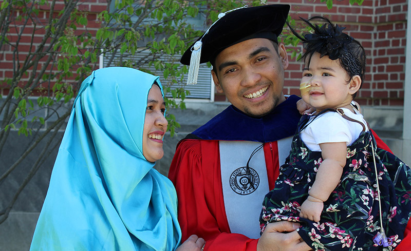 EHE doctoral student with wife and daughter