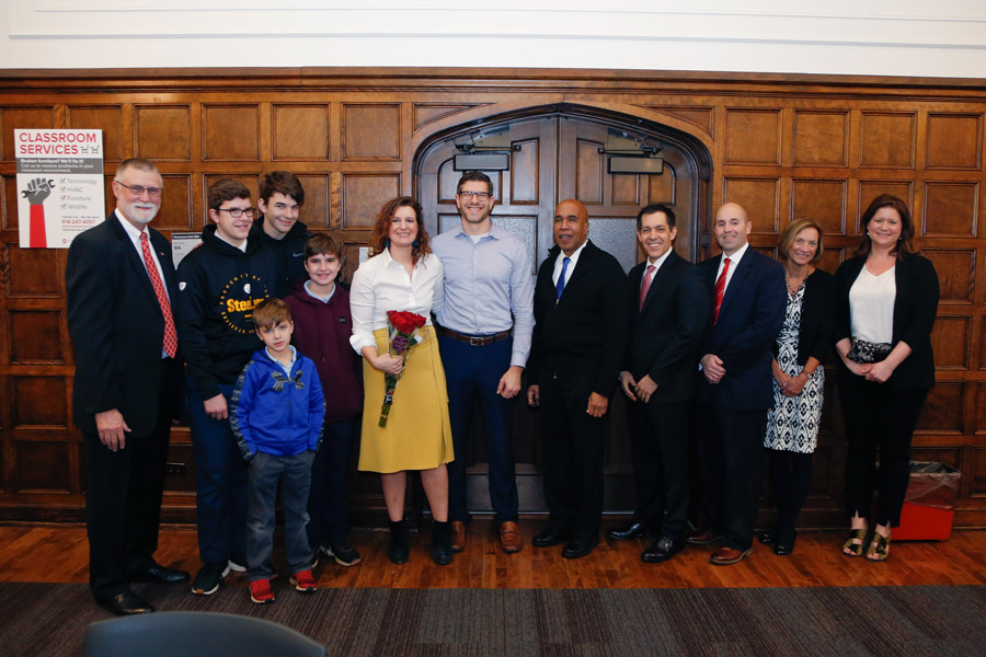 Claire Kamp Dush, her family and Ohio State administrators