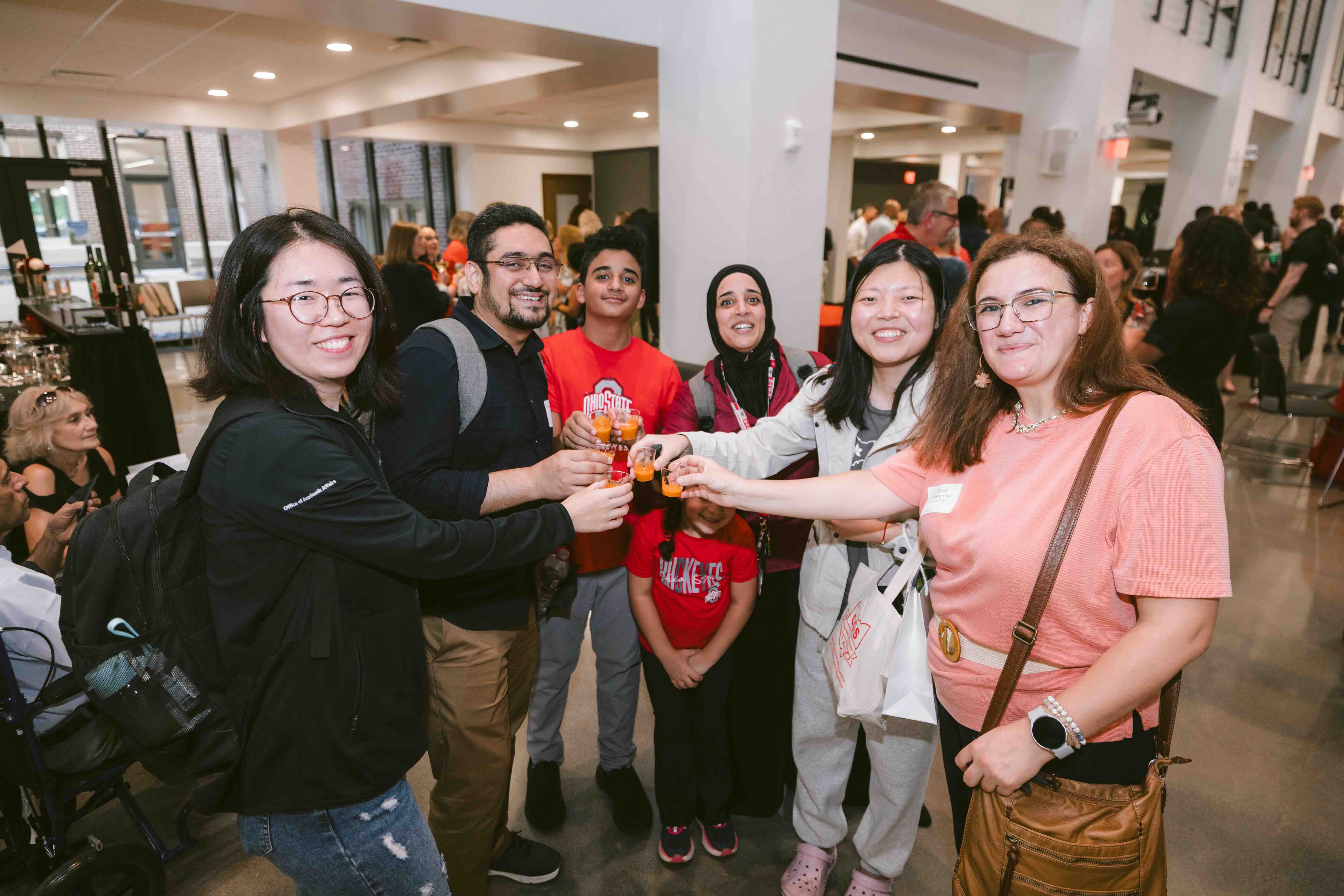 Faculty and staff celebrate during the reception of Campbell Hall reopening