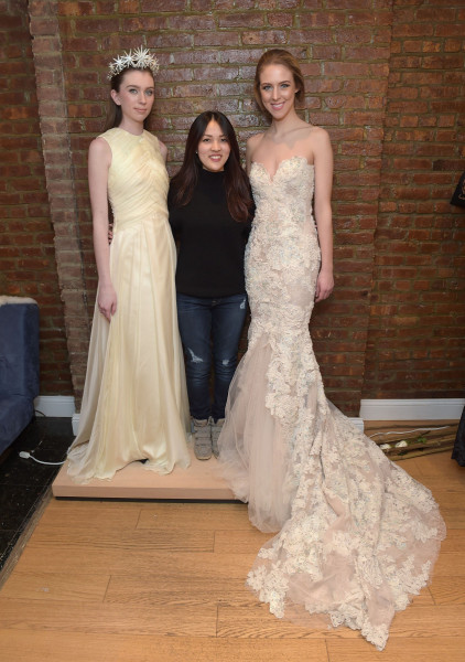 Mety Choa with two models in wedding dresses of her own design
