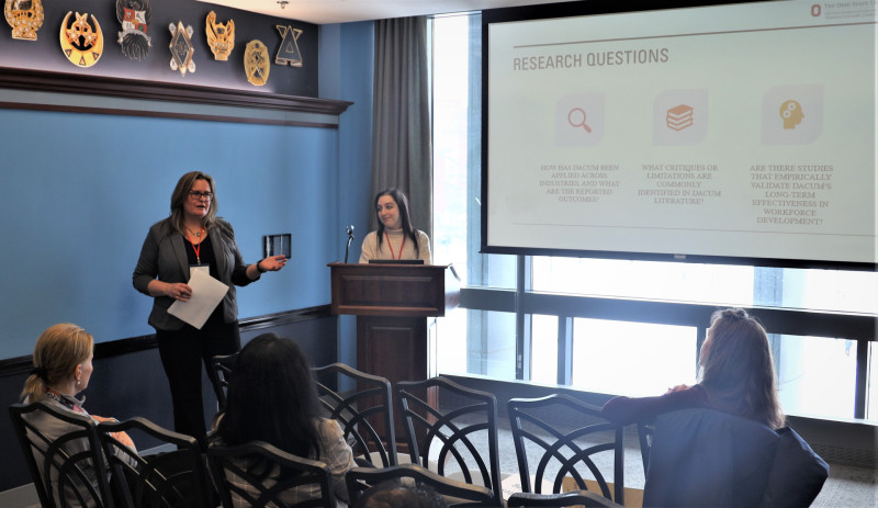 Associate Director Traci Lepicki, left, Center on Education and Training for Employment, presented at the Research Forum with Graduate Research Associate Elizabeth Kazemi