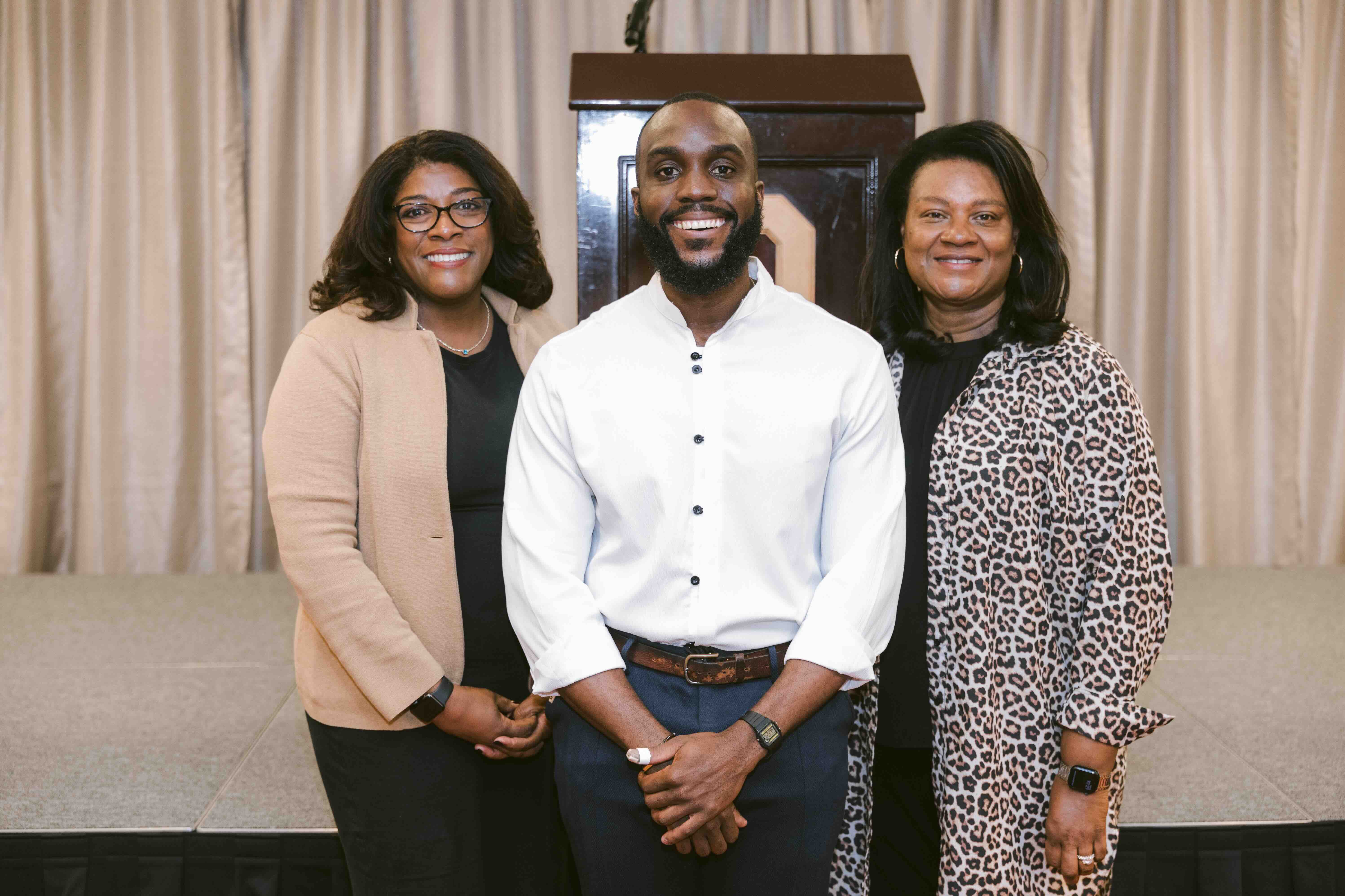 Detra Price, executive director of the Center for Innovation and Digital Learning, Crachad Laing, keynote speaker from Windsor School, and Nicole Luthy, the college’s chief of staff.