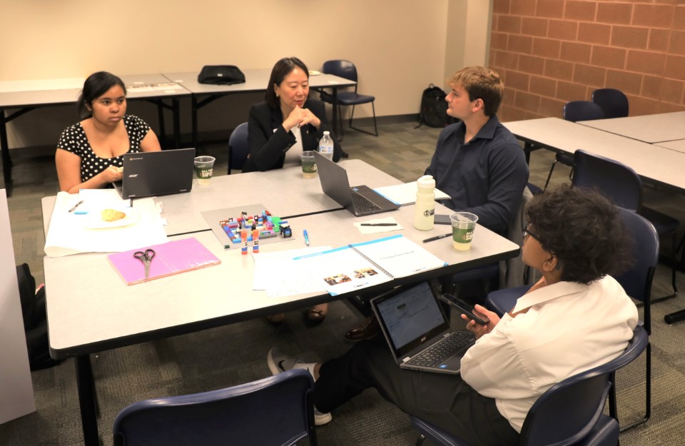 Professors mentoring high school students