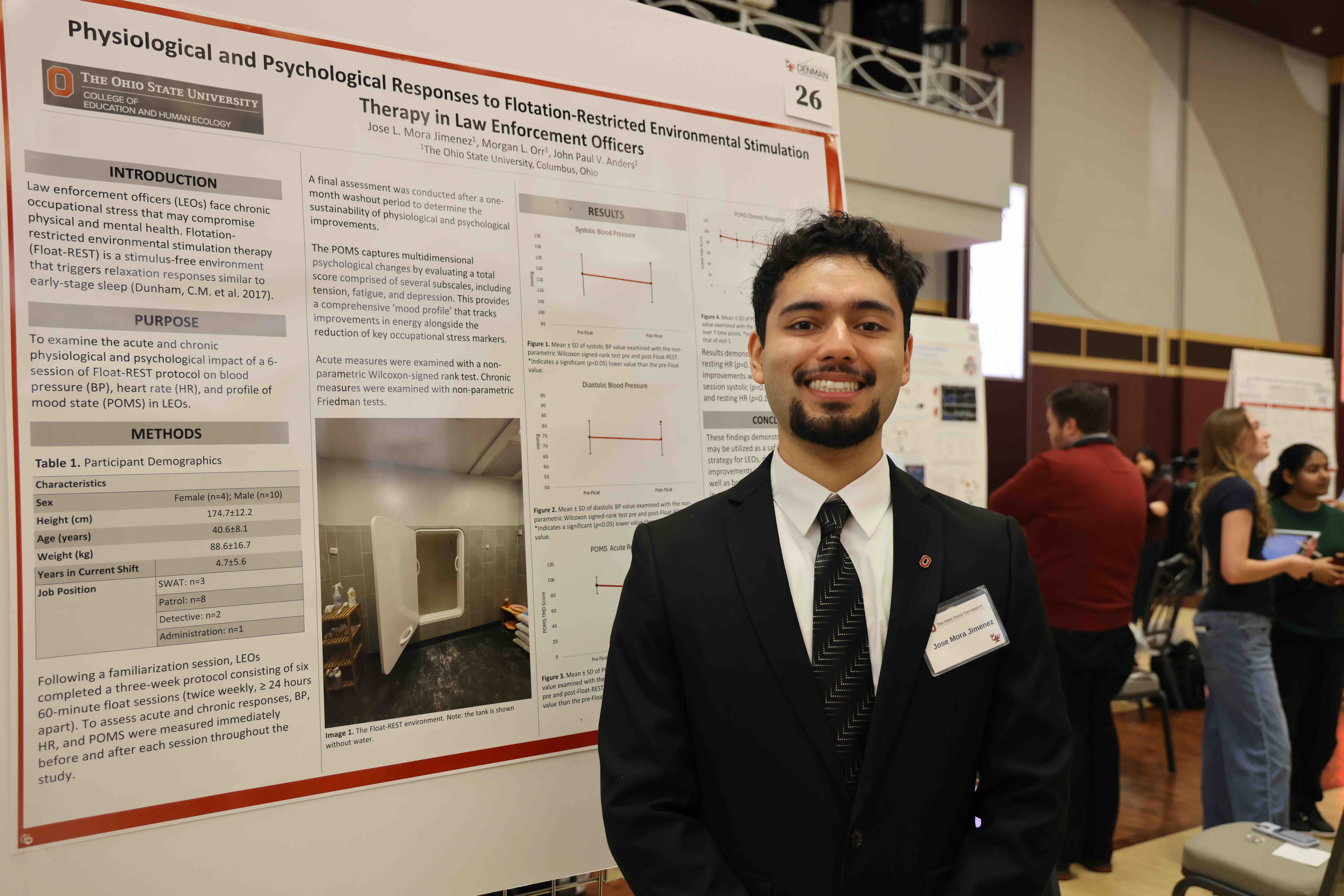 Jose Mora Jimenez presenting research poster at forum