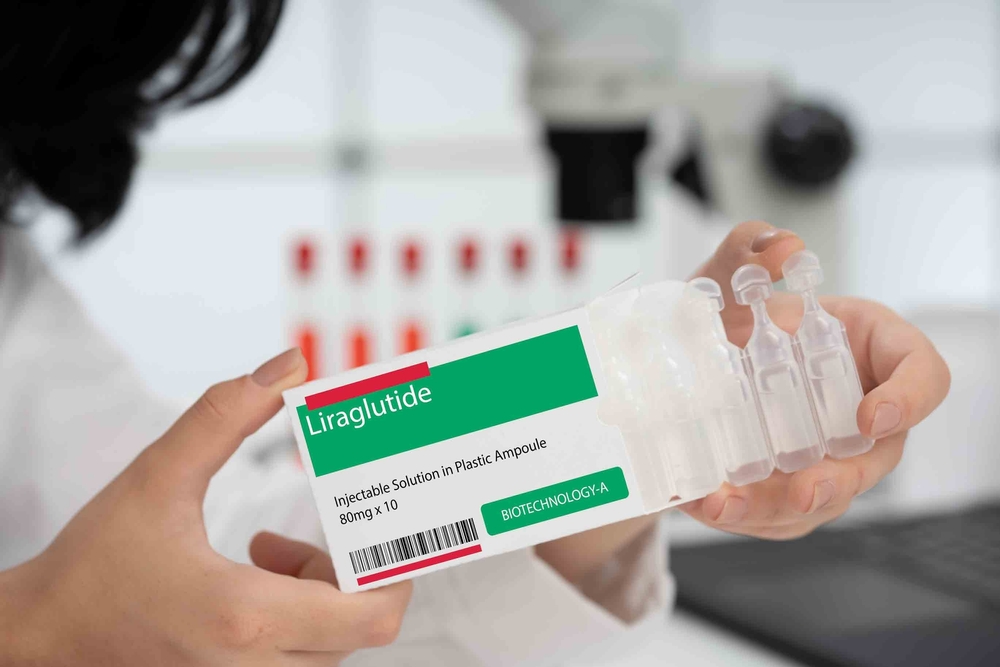 box of medicine being examined in a pharmaceutical lab