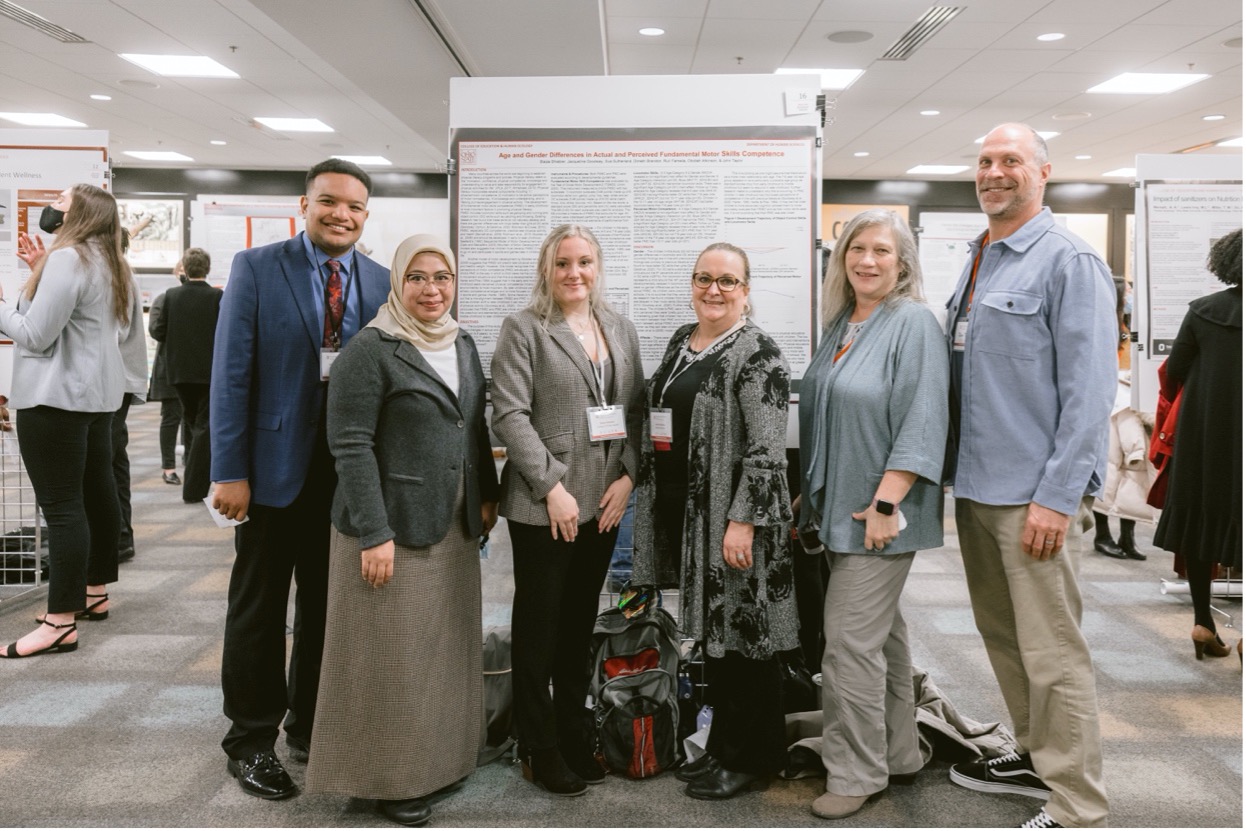 L-R: Dimetri Brandon, Postdoctoral Scholar Ruri Famelia, Blaize Schiebler and John Taylor (right) conduct research with professors Jackie Goodway (third from right) and Professor Sue Sutherland (second from right).