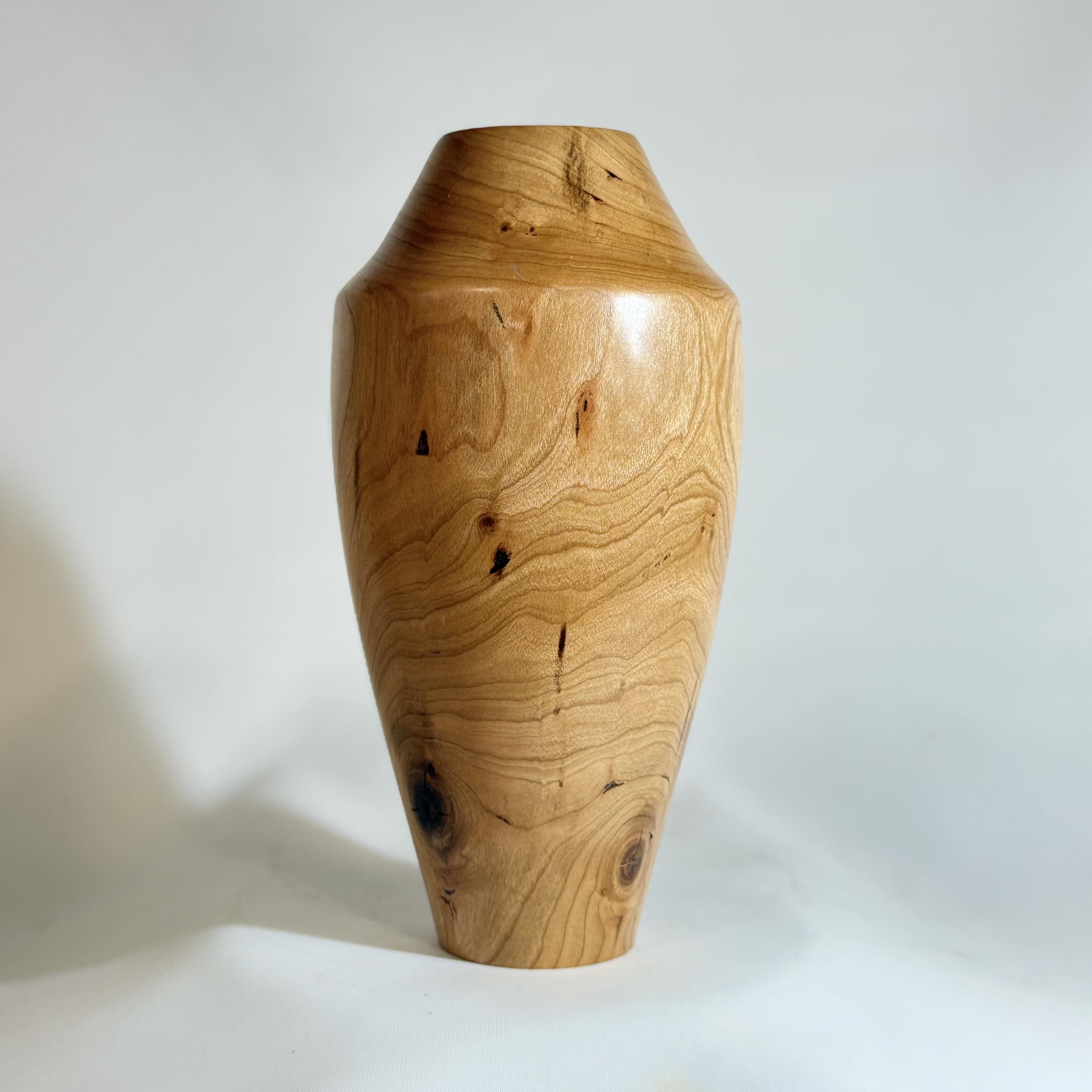 Wooden vase carving