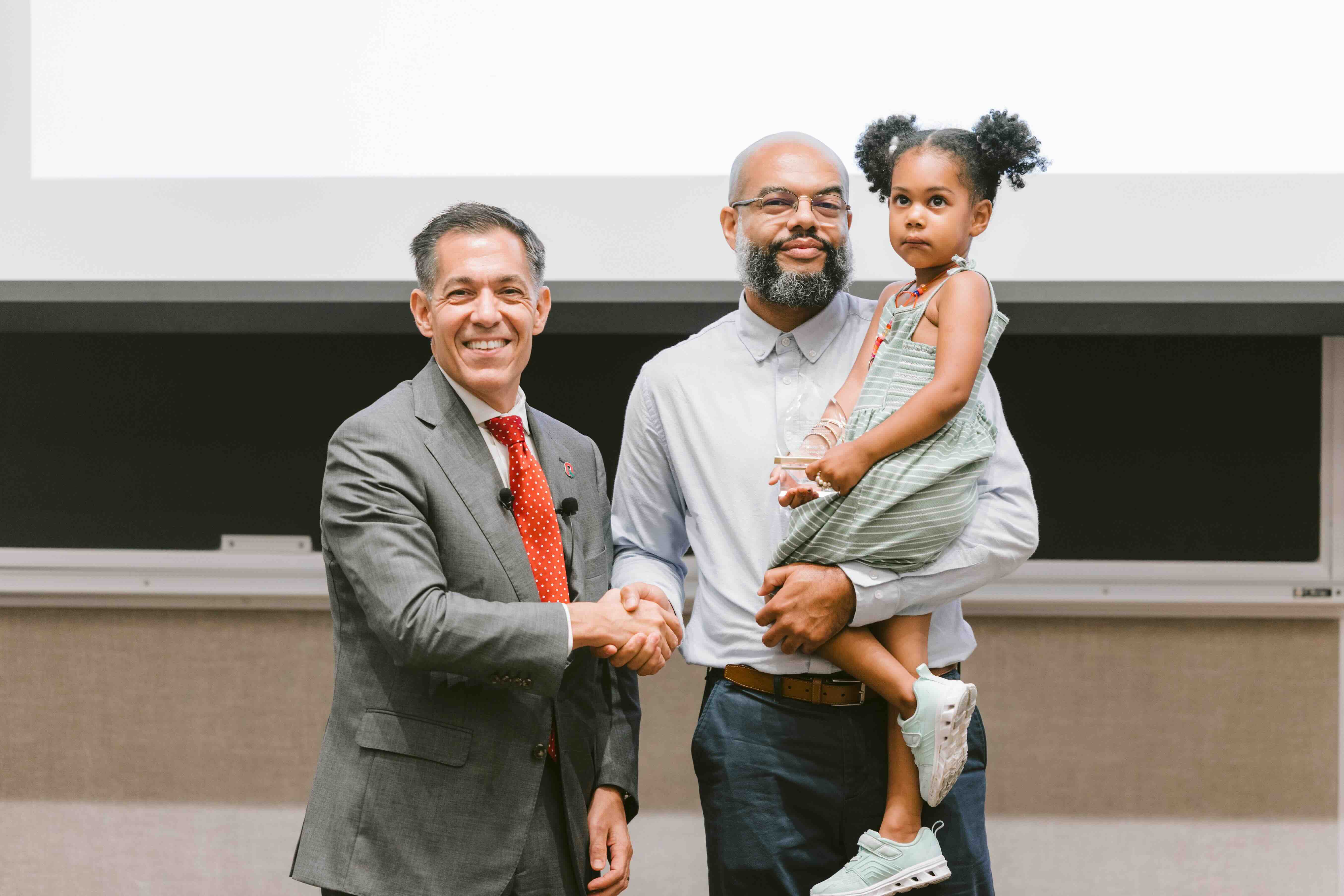 Steven Stone-Sabali accepting an award