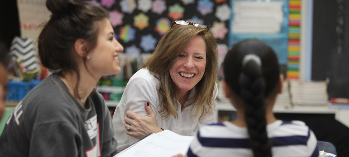 Teacher with students