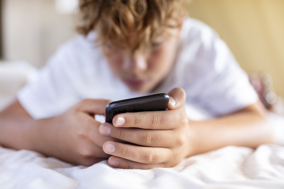teen using a smartphone