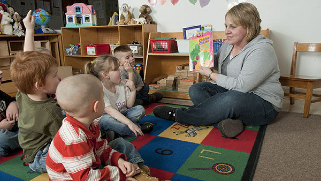 teacher reading to students