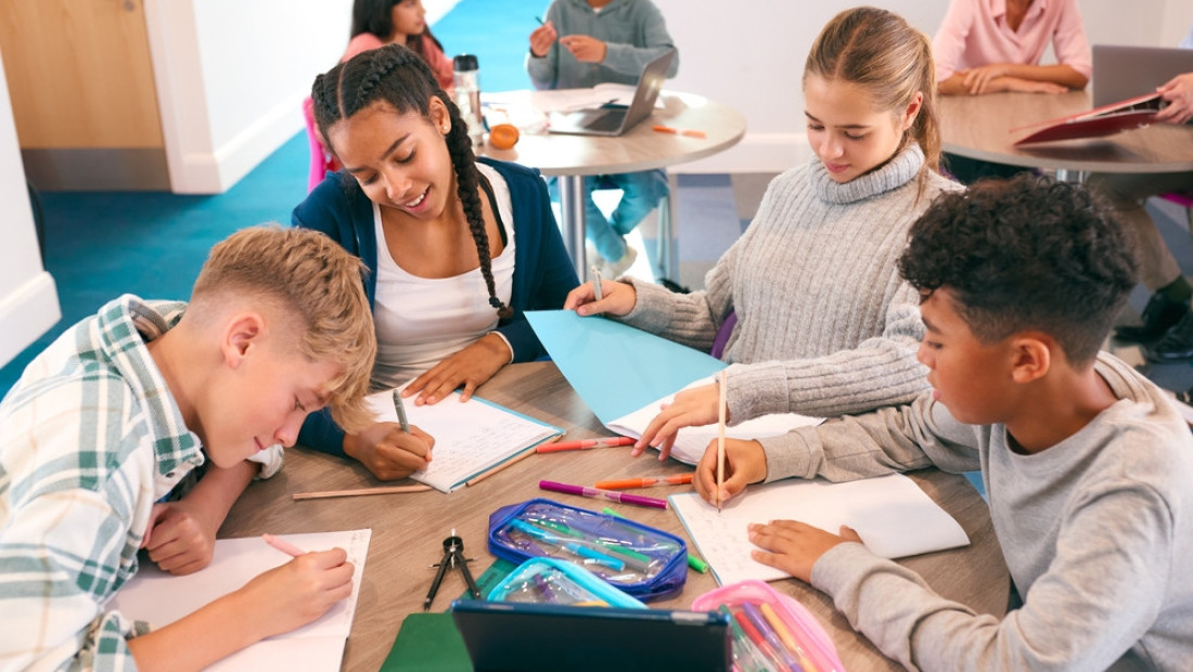Teachers working with students in a classroom