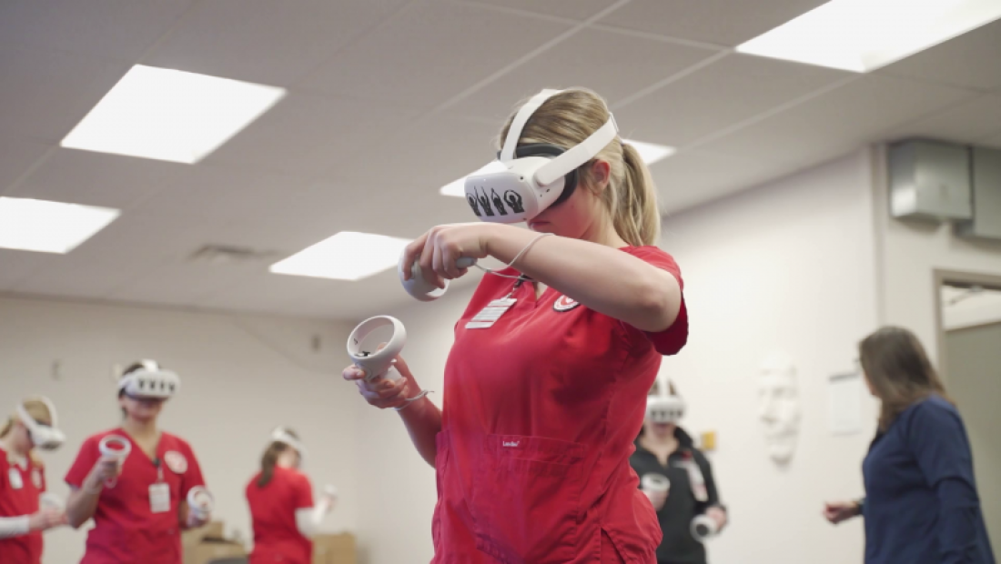 Ohio State nursing student using VR headset