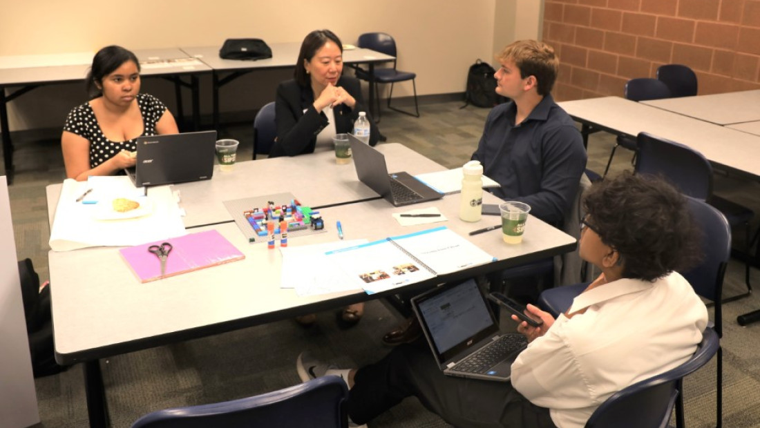 Professors mentoring high school students