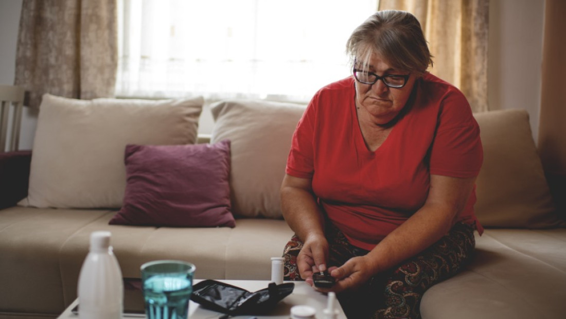 Diabetes patient at home with their medication
