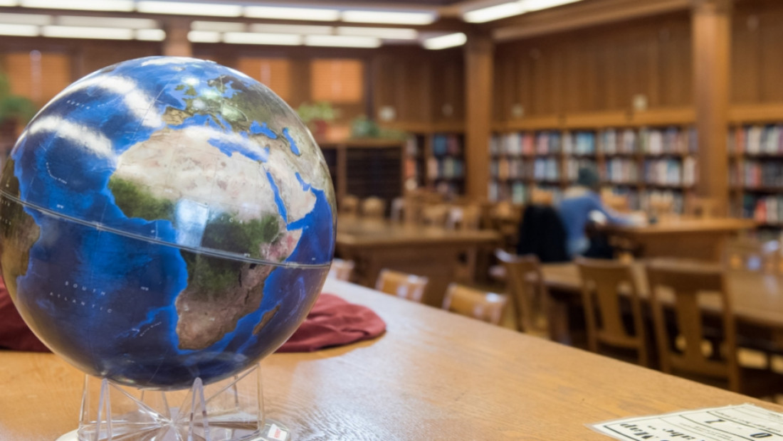 globe on table in library