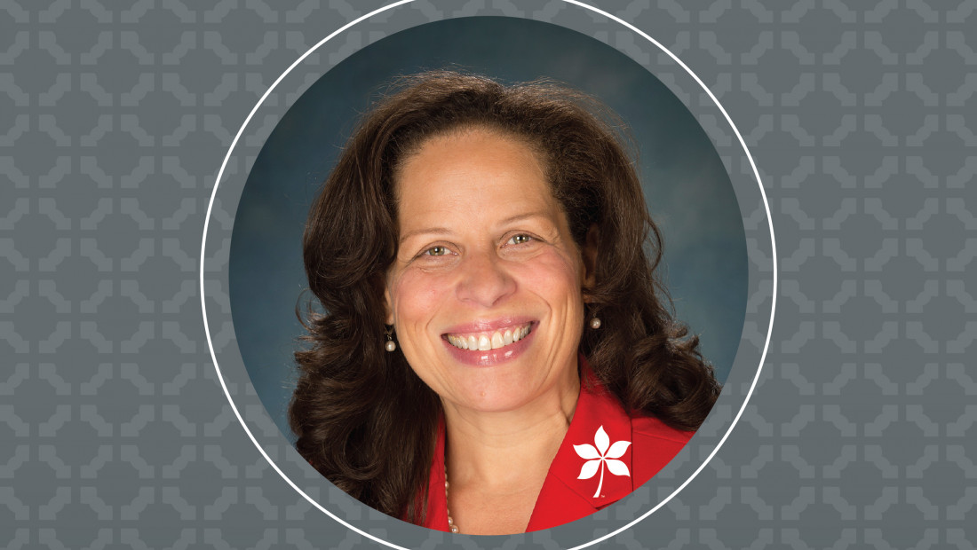 headshot of Karen Beard on OSU patterned gray background