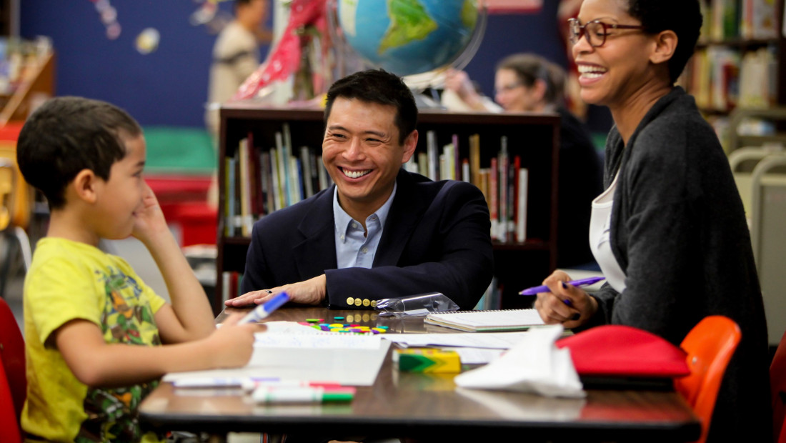 Chao in classroom with two students