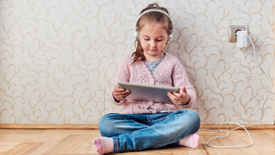 preschool student on tablet