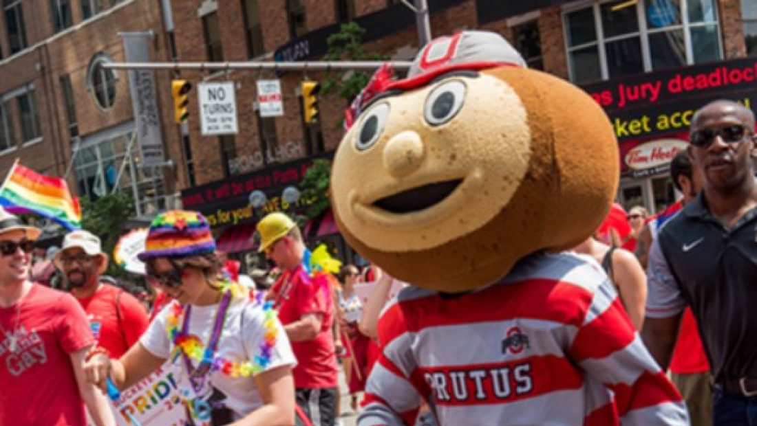 Brutus and students at pride parade
