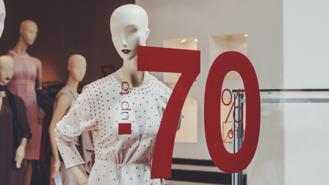 a display of mannequins in a store window