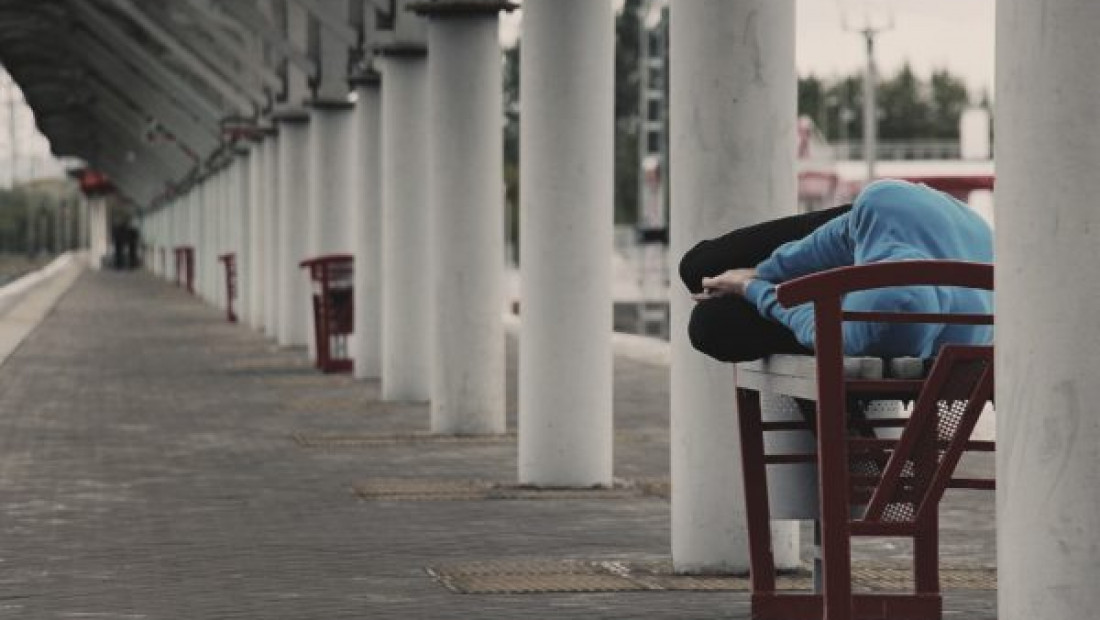 homeless youth on bench