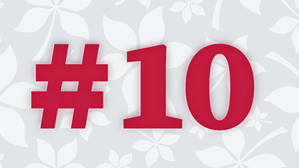 The number 10 in scarlet numbers with a buckeye leaf patterned background