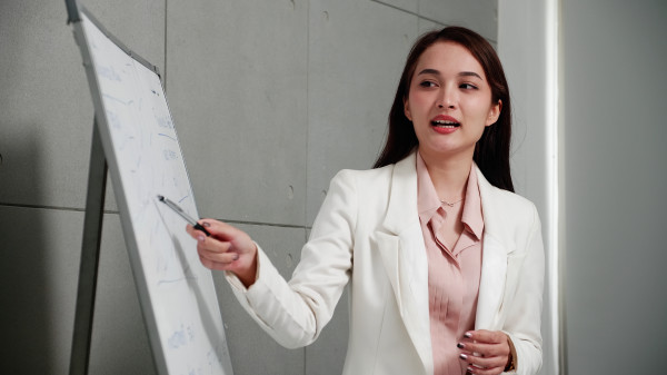 businesswoman holds meeting presentation