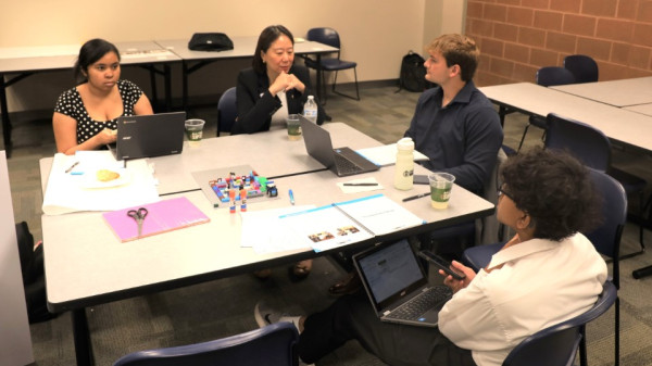 Professors mentoring high school students