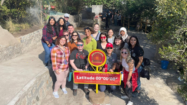 Ohio State students at a trail marker in Ecuador
