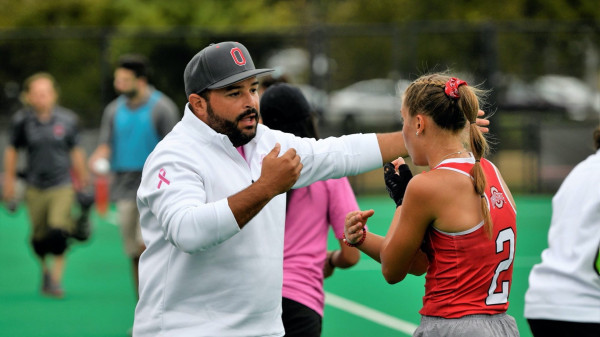 coach talking to player