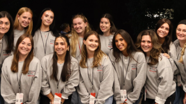 Fashion and Retail Studies student ambassadors posing in matching sweatshirts