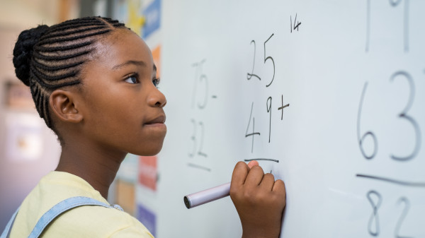 Girl working with math