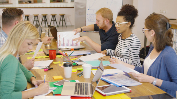 group of teachers working in a conference room