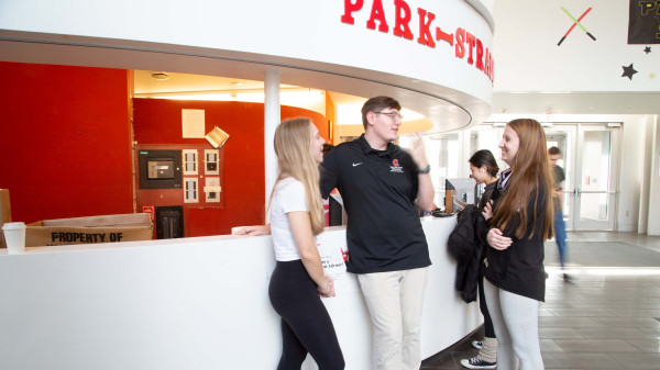 Ohio State SPA students talking at front desk