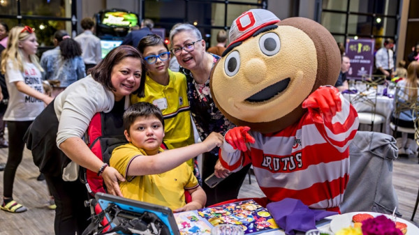 Brutus the Buckeye at hospitality management event