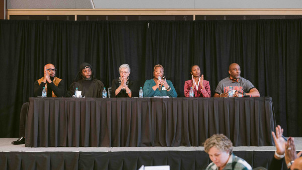 Newbery Symposium authors on stage during the event