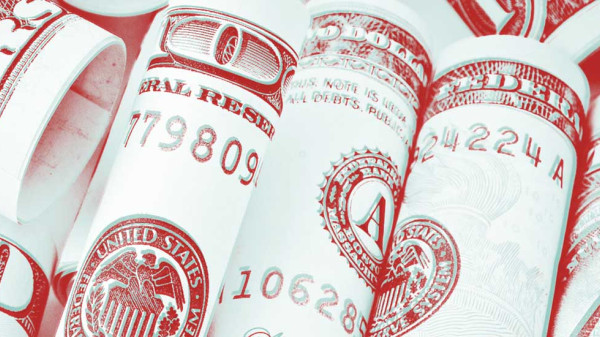 several rolled banknotes