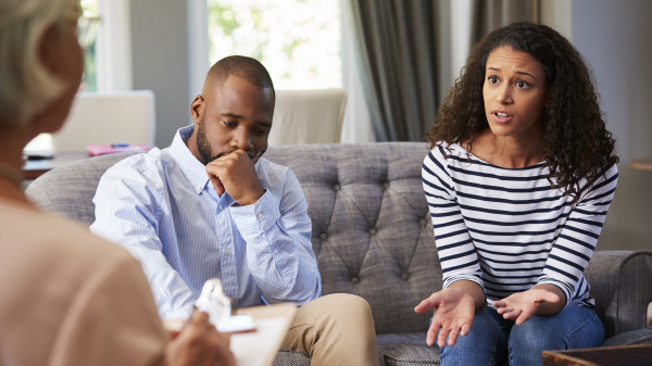 young couple having marriage counselling