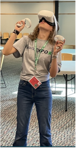 College student wearing VR headset