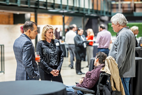 Department Chair Erik Porfeli and Clinical Assistant Professor Anne Turpin greet attendees