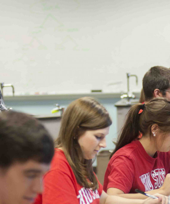 teacher in class with students