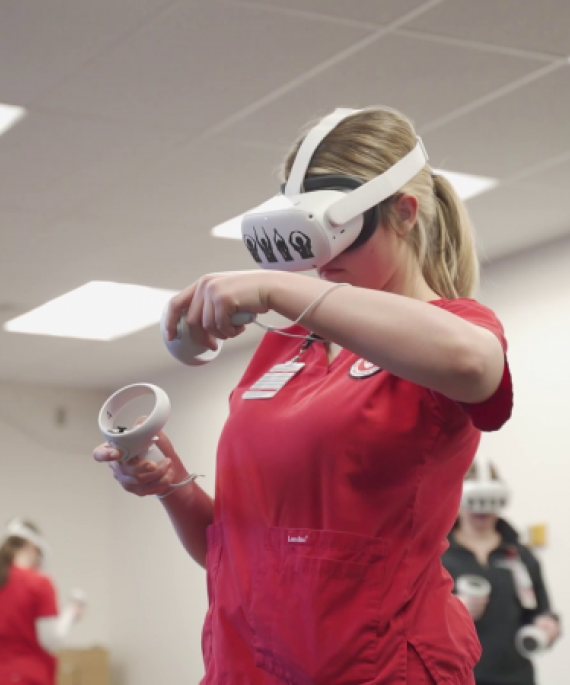Ohio State nursing student using VR headset