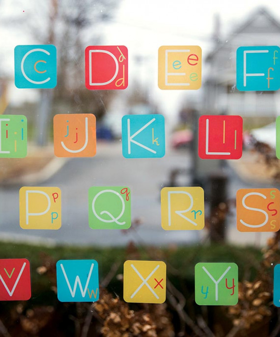 Alphabet sticky notes on a window