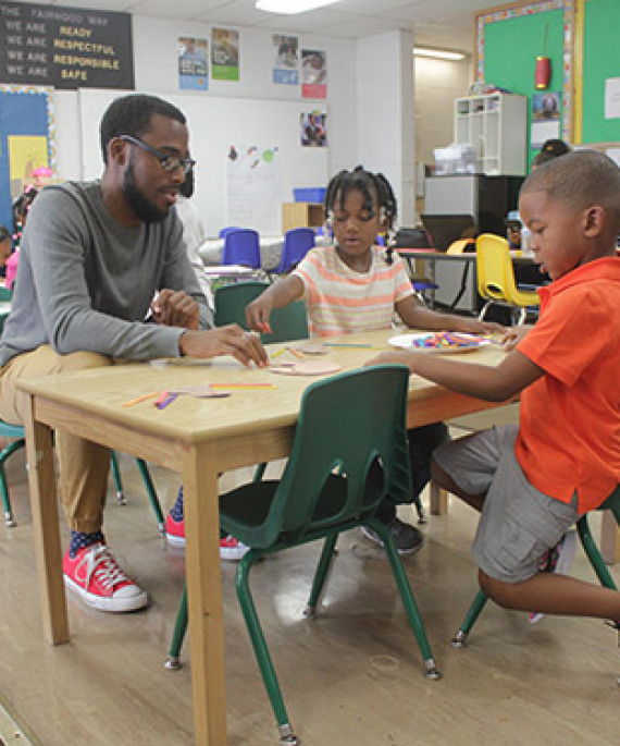 Ed Thomas with students