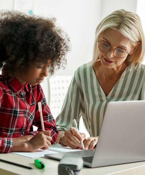 girl learning with tutor