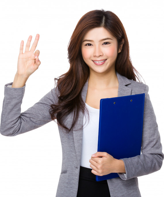 businesswoman-hold-with-clipboard-and-ok-sign-gest