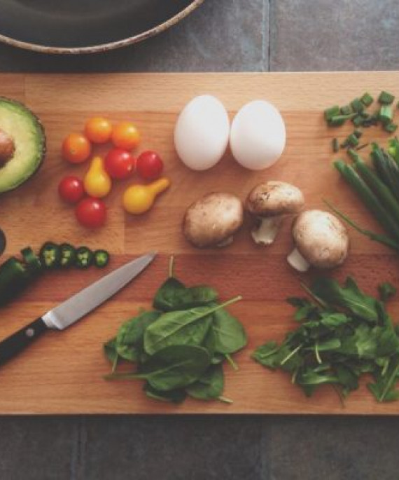 cutting board with sliced vegetables