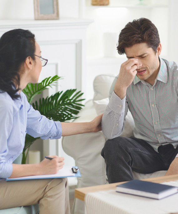 depressed man feeling drawn at psychotherapist